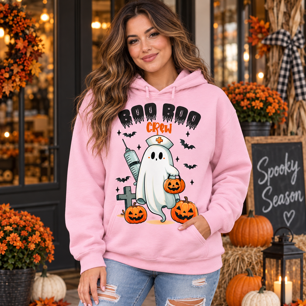 Model wearing Boo Boo Crew nurse ghost Halloween hoodie