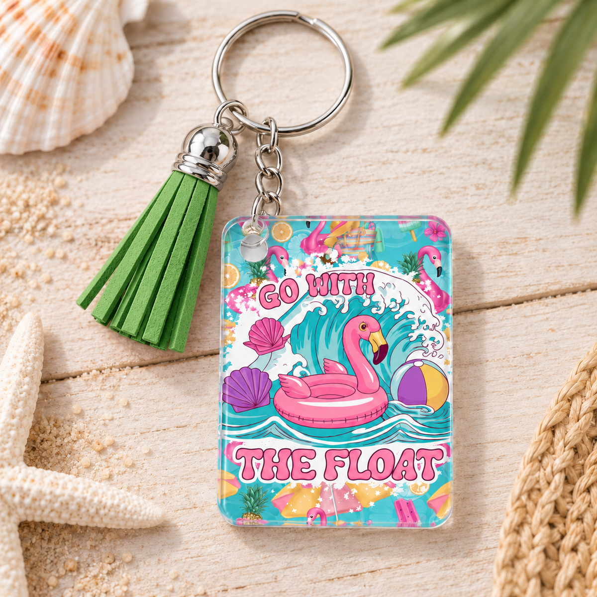 Go With the Float keychain with green tassel