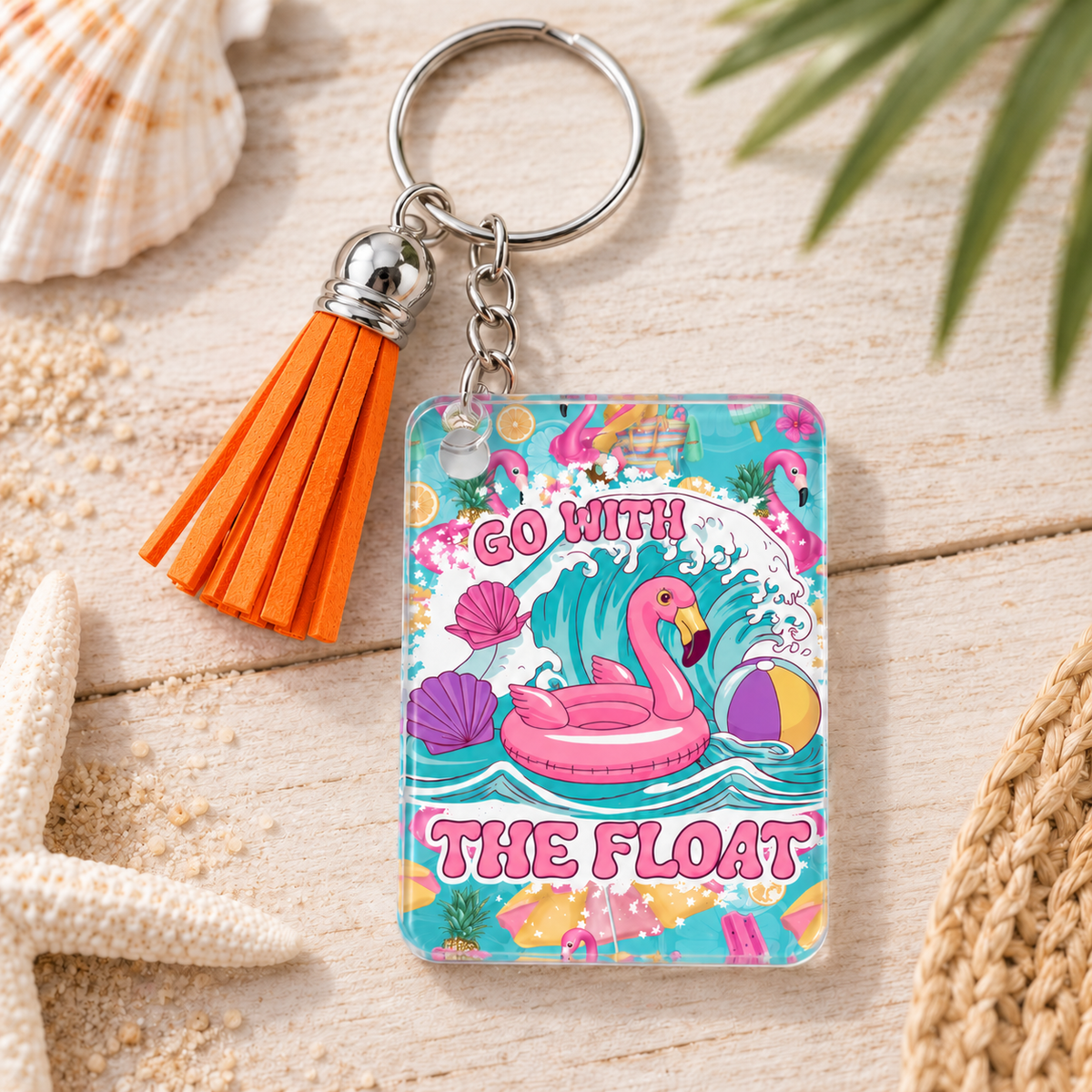 Go With the Float keychain with orange tassel
