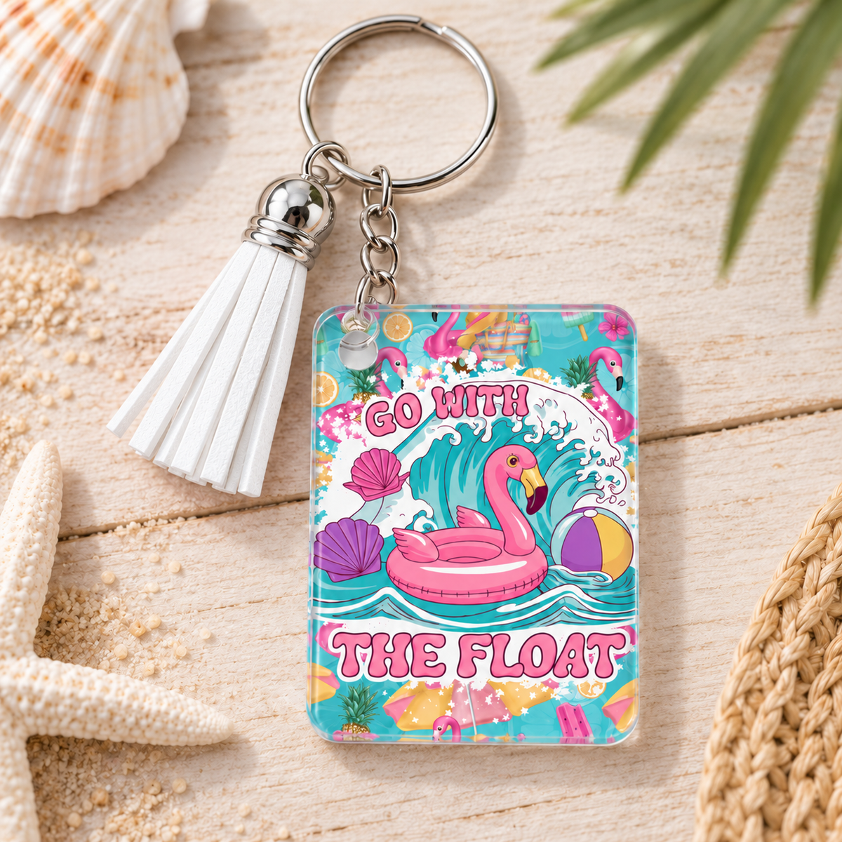 Go With the Float keychain with white tassel