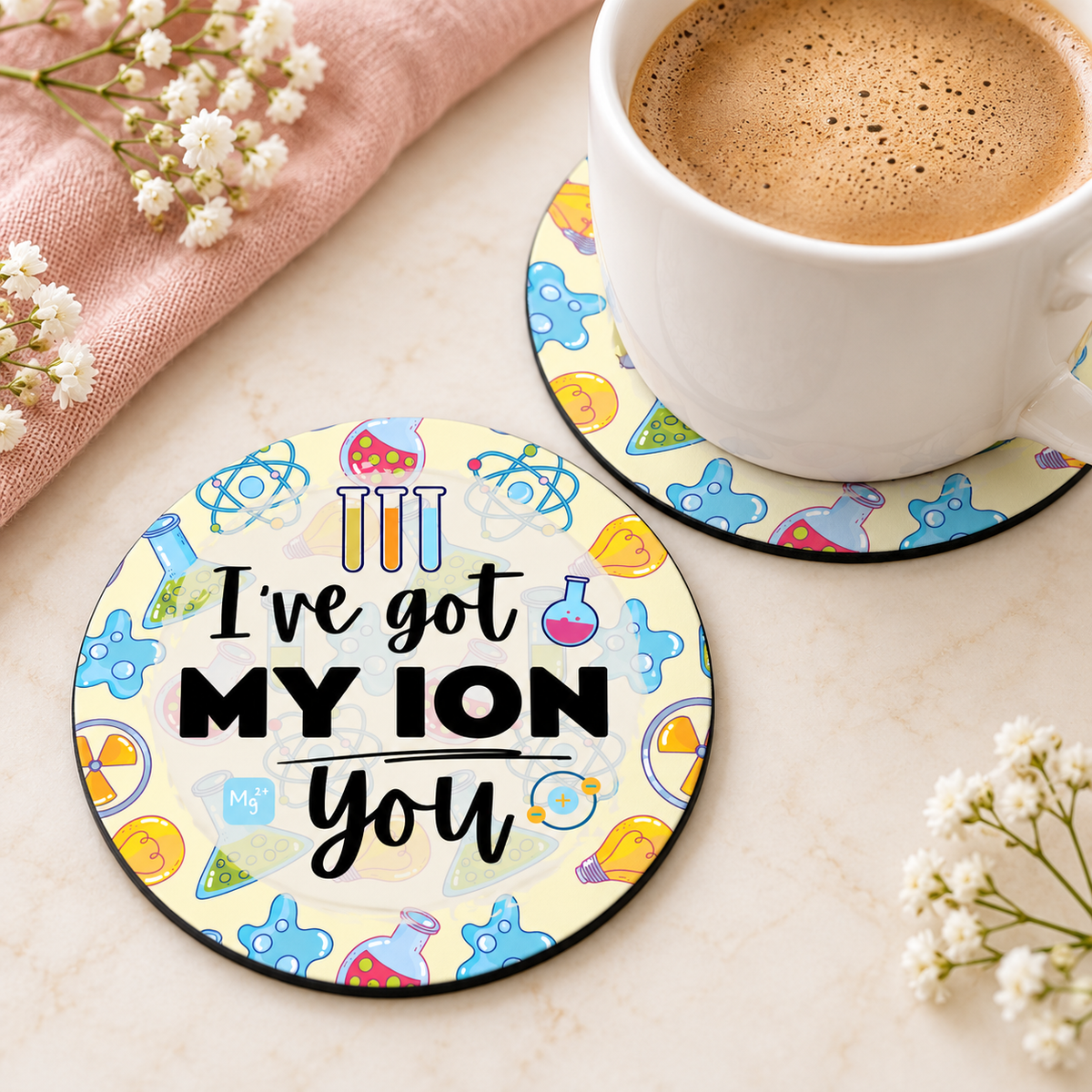 I've Got My Ion You round coaster set of two with thin black rubber backing