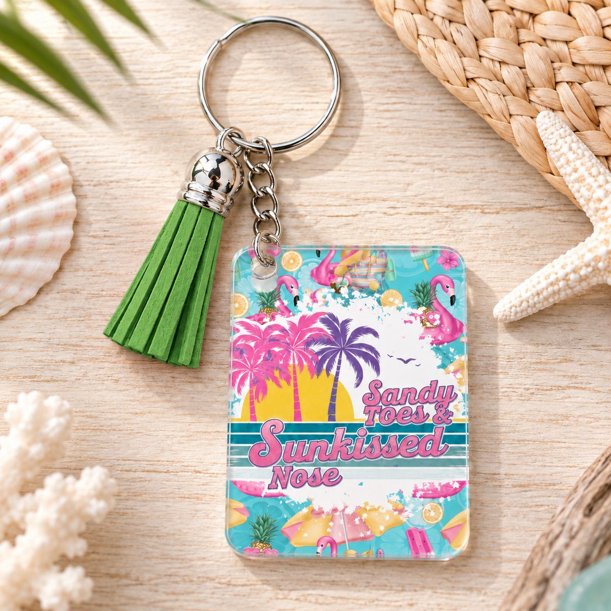 Sandy Toes Sunkissed Nose keychain with green tassel
