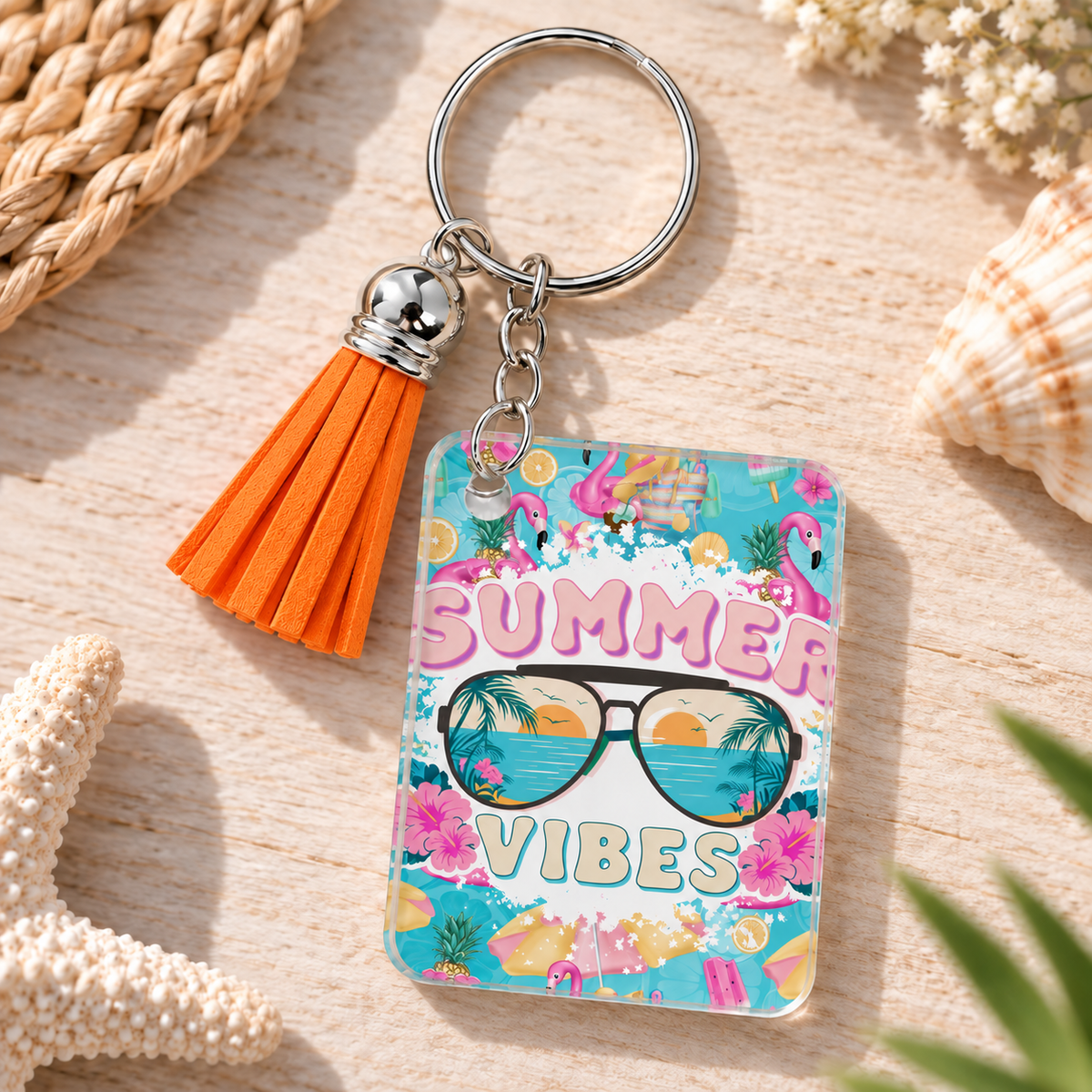 Summer Vibes keychain with orange tassel
