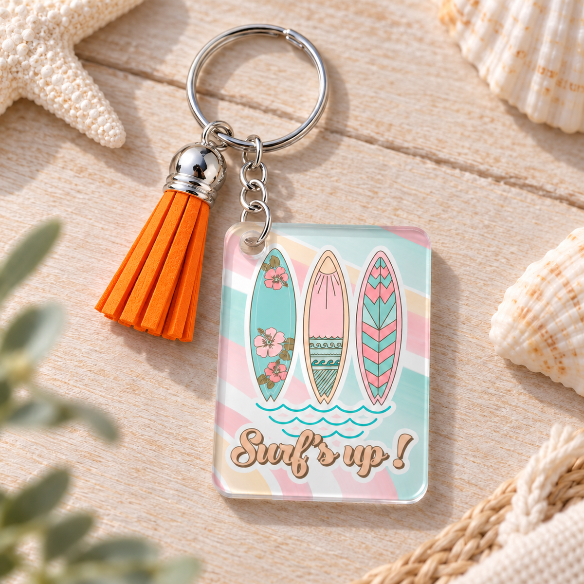 Surf's Up keychain with orange tassel