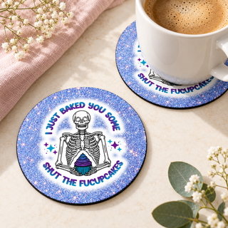 Fresh Baked Shut the Fucupcakes round coaster set of two with thin black rubber backing