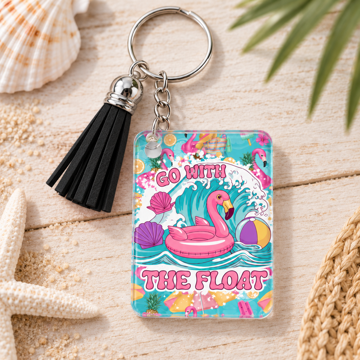 Go With the Float keychain with black tassel