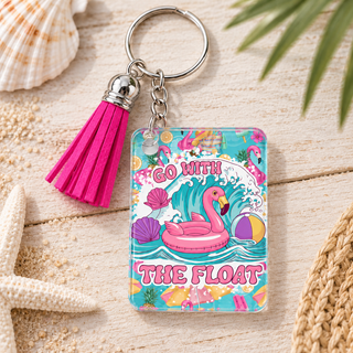 Go With the Float keychain with hot pink tassel