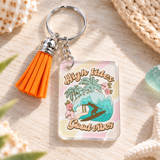 High Tides Good Vibes keychain with orange tassel