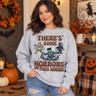 Model wearing There's Some Horrors in This House Halloween crewneck