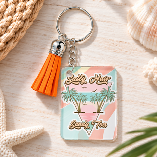 Salty Hair Sandy Toes keychain with orange tassel