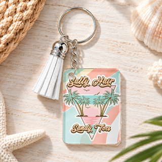 Salty Hair Sandy Toes keychain with white tassel