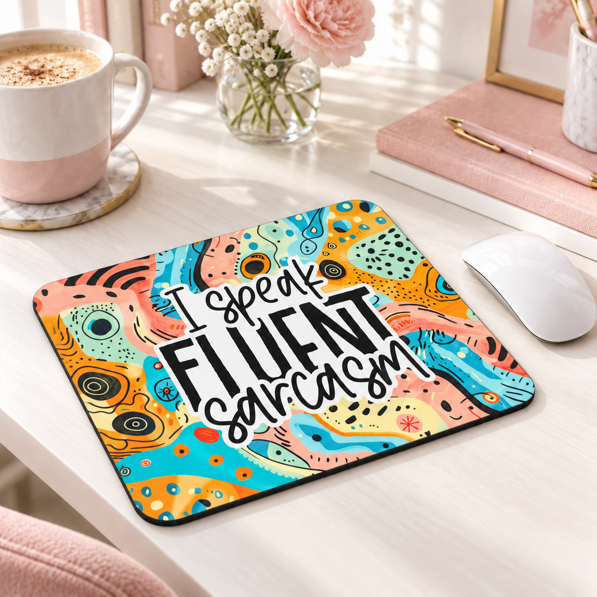 I Speak Fluent Sarcasm mouse pad with teal, orange and yellow abstract shapes