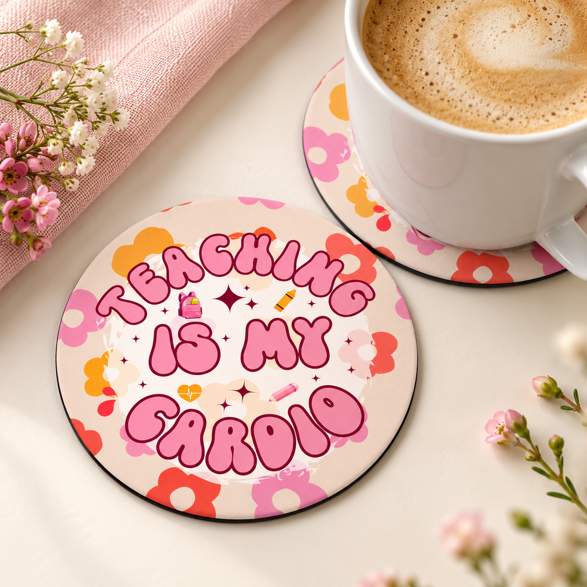 Teaching Is My Cardio round coaster set of two with thin black rubber backing